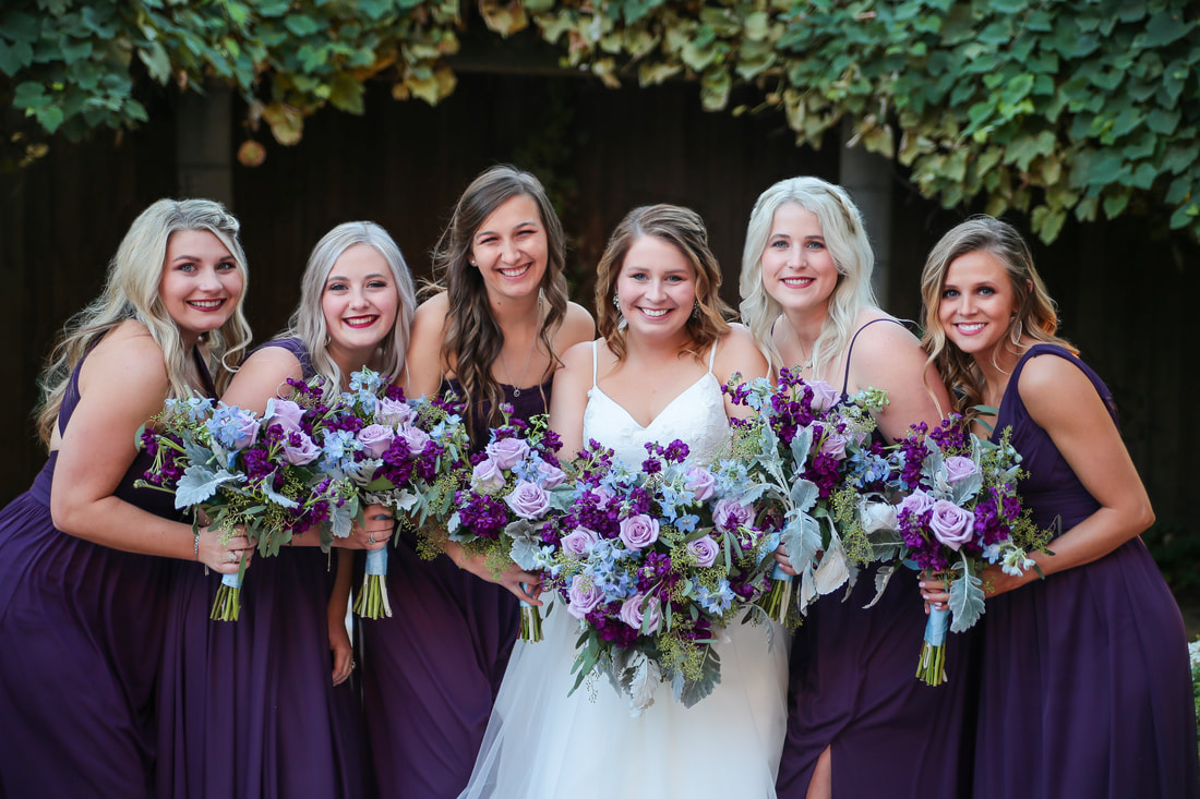 Bride and bridesmaids by affordable wedding photographer in OKC