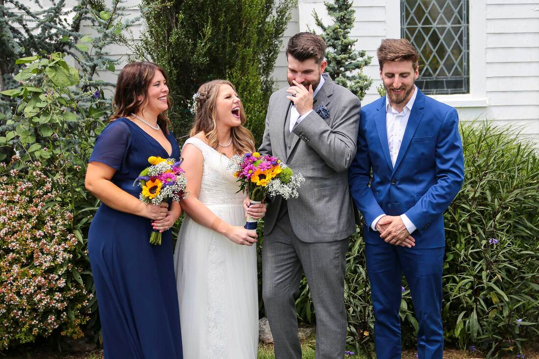 candid wedding photo of wedding party laughing in OKC